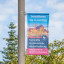 Street Banner Basic mit Ausleger, befestigt an einem Laternenmast